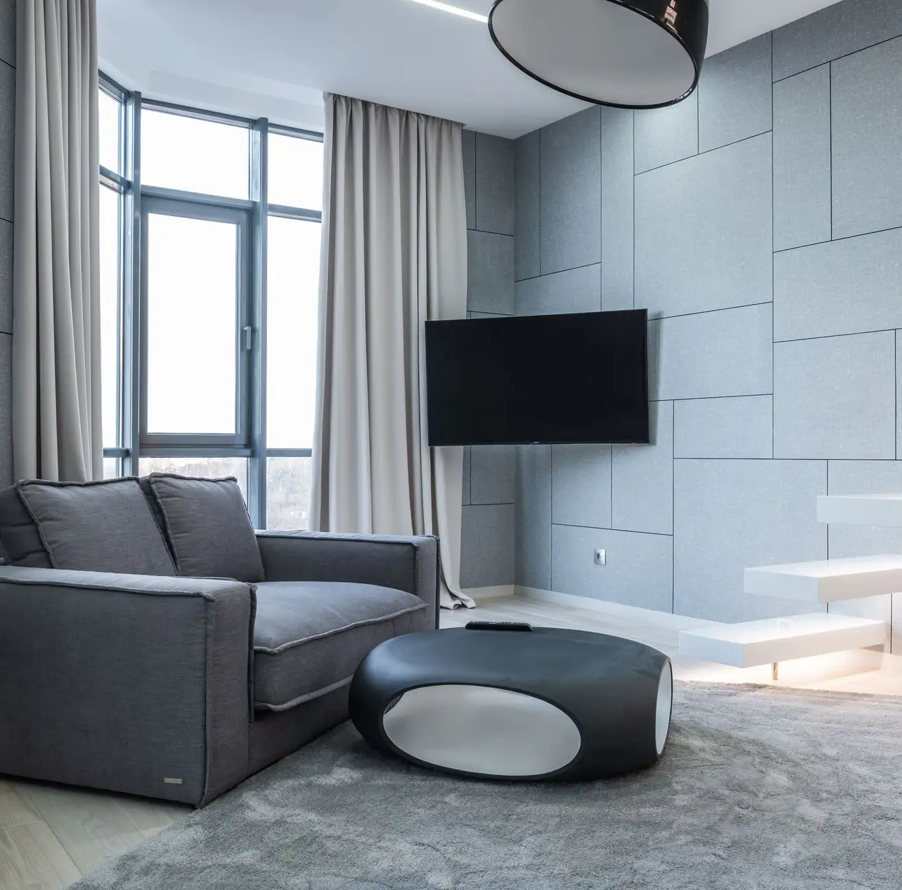 Living room carpet | Carpet cleaning in Gateshead Modern living room with a grey sofa and soft neutral carpet, carpet cleaning in Gateshead