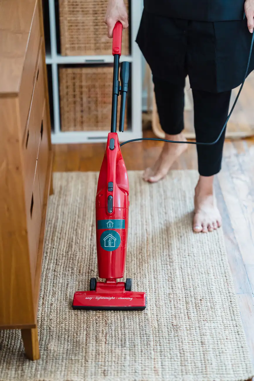 Rug vacuuming | Carpet cleaning in Jesmond Vacuum cleaner being used on a patterned rug, carpet cleaning in Jesmond