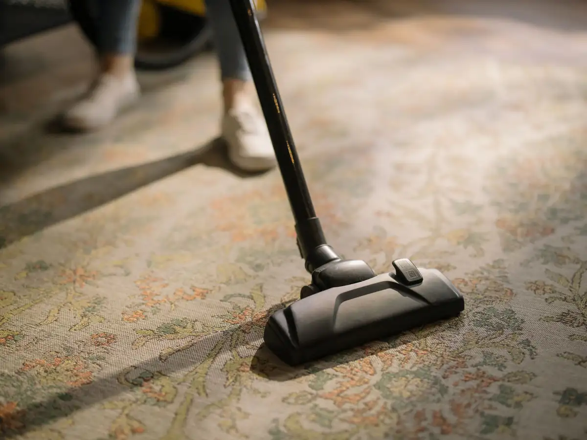 Carpet vacuuming | Carpet cleaning in Newcastle Vacuum head working across a patterned carpet, professional carpet cleaning in Newcastle