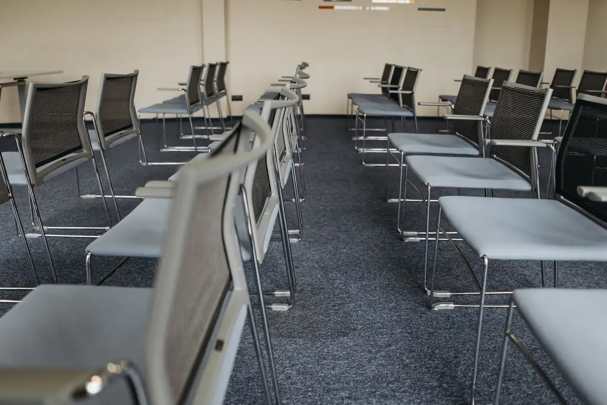 Conference room carpet | Commercial carpet cleaning in Newcastle Carpeted conference and function room set out with tables, commercial carpet cleaning in Newcastle